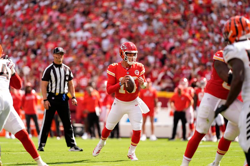 Kansas City Chiefs quarterback Patrick Mahomes drops back to pass during the first half of an NFL football game against the Cincinnati Bengals Sunday, Sept. 15, 2024, in Kansas City, Mo. (AP Photo/Charlie Riedel)