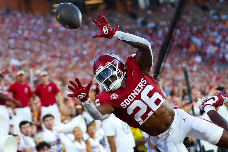 Sep 21, 2024; Norman, Oklahoma, USA;  Oklahoma Sooners defensive back Kani Walker (26) cannot make an interception  during the first quarter against the Tennessee Volunteers at Gaylord Family-Oklahoma Memorial Stadium. Mandatory Credit: Kevin Jairaj-Imagn Images