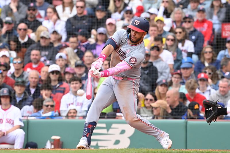 May 12, 2024; Boston, Massachusetts, USA;  Washington Nationals second baseman Luis Garcia Jr. (2) breaks hit bat during the third inning against the Boston Red Sox at Fenway Park. Mandatory Credit: Eric Canha-USA TODAY Sports