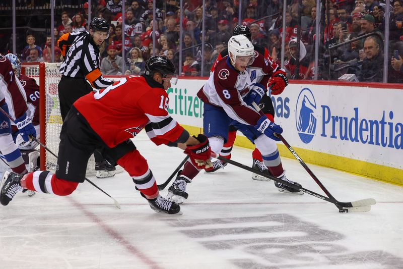 Feb 6, 2024; Newark, New Jersey, USA; Colorado Avalanche defenseman Cale Makar (8) plays the puck while being defended by New Jersey Devils left wing Ondrej Palat (18) during the second period at Prudential Center. Mandatory Credit: Ed Mulholland-USA TODAY Sports