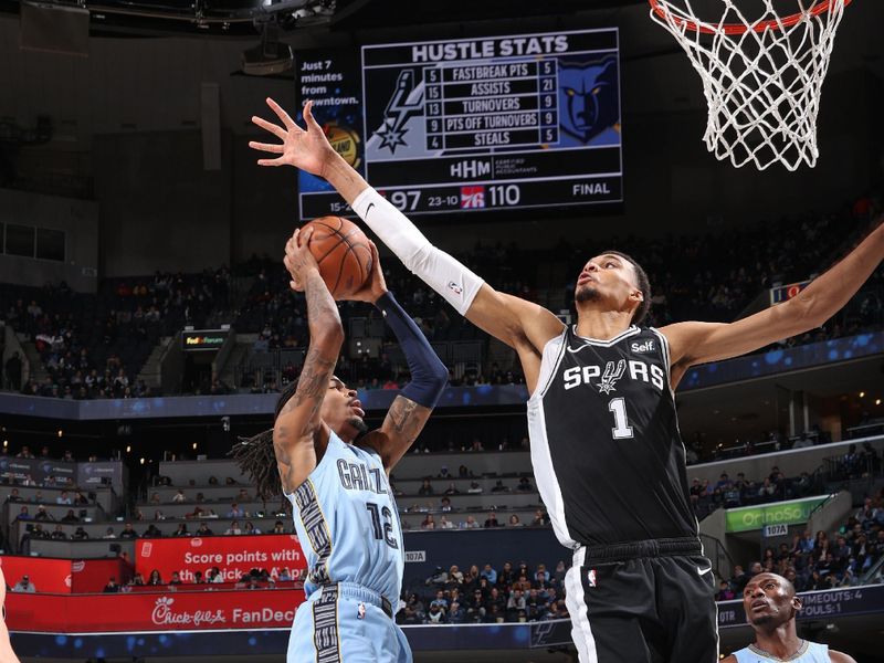 MEMPHIS, TN - JANUARY 2:  Ja Morant #12 of the Memphis Grizzlies goes to the basket during the game on January 2, 2024 at FedExForum in Memphis, Tennessee. NOTE TO USER: User expressly acknowledges and agrees that, by downloading and or using this photograph, User is consenting to the terms and conditions of the Getty Images License Agreement. Mandatory Copyright Notice: Copyright 2024 NBAE (Photo by Joe Murphy/NBAE via Getty Images)