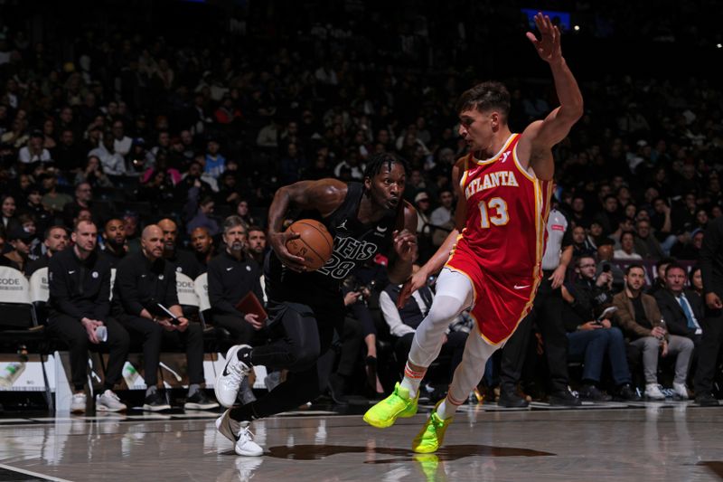 BROOKLYN, NY - FEBRUARY 29: Dorian Finney-Smith #28 of the Brooklyn Nets dribbles the ball during the game against the Atlanta Hawks on February 29, 2024 at Barclays Center in Brooklyn, New York. NOTE TO USER: User expressly acknowledges and agrees that, by downloading and or using this Photograph, user is consenting to the terms and conditions of the Getty Images License Agreement. Mandatory Copyright Notice: Copyright 2024 NBAE (Photo by Jesse D. Garrabrant/NBAE via Getty Images)