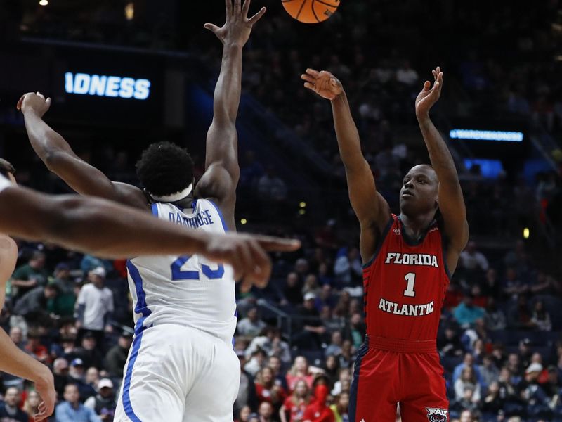 Mar 17, 2023; Columbus, OH, USA; Florida Atlantic Owls guard Johnell Davis (1) shoots the ball over Memphis Tigers forward Malcolm Dandridge (23) in the first half at Nationwide Arena. Mandatory Credit: Joseph Maiorana-USA TODAY Sports