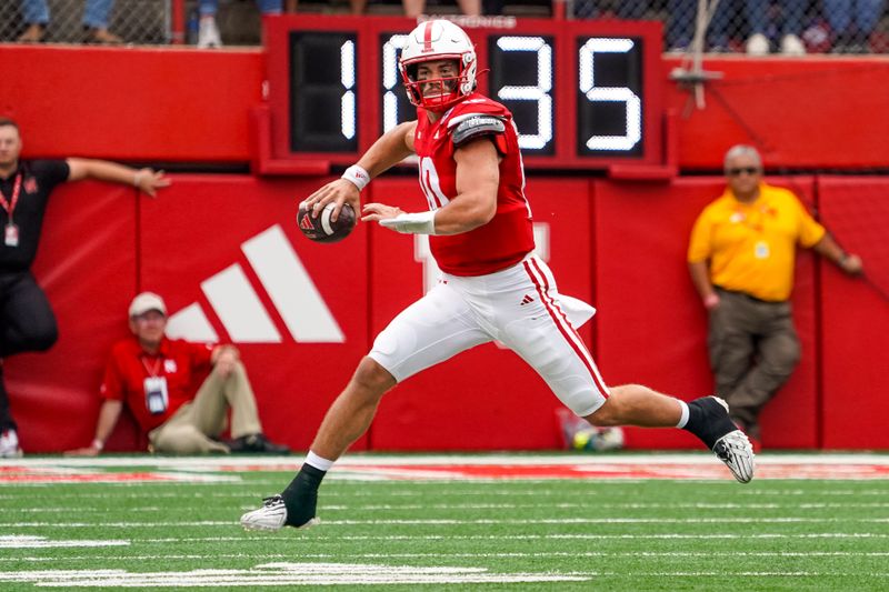 Sep 23, 2023; Lincoln, Nebraska, USA; Nebraska Cornhuskers quarterback Heinrich Haarberg (10) passes against the Louisiana Tech Bulldogs during the first quarter at Memorial Stadium. Mandatory Credit: Dylan Widger-USA TODAY Sports