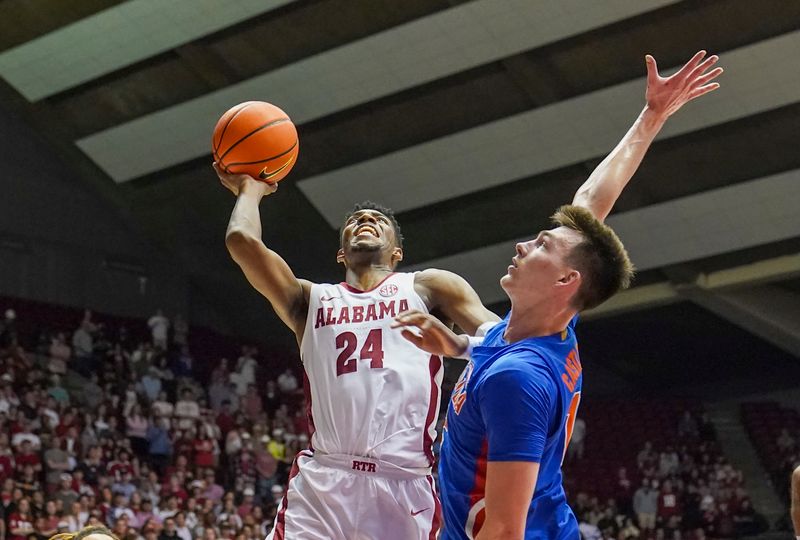 Feb 8, 2023; Tuscaloosa, Alabama, USA; Alabama Crimson Tide forward Brandon Miller (24) shoots against Florida Gators forward Colin Castleton (12) during the second half at Coleman Coliseum. Mandatory Credit: Marvin Gentry-USA TODAY Sports