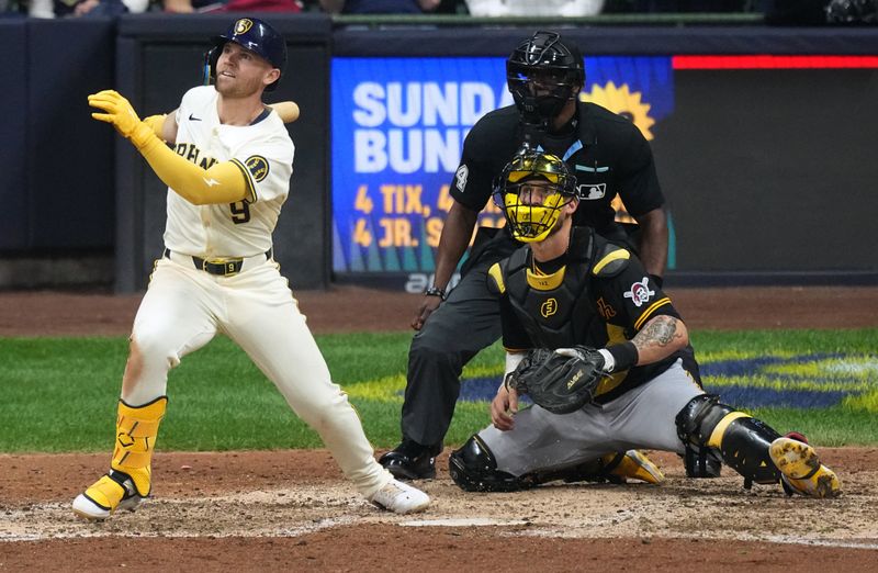 May 13, 2024; Milwaukee, Wisconsin, USA;  Milwaukee Brewers first base Jake Bauers (9) watches his grand slam home run during the eighth inning of their game against the Pittsburgh Pirates at American Family Field. Mandatory Credit: Mark Hoffman-USA TODAY Sports