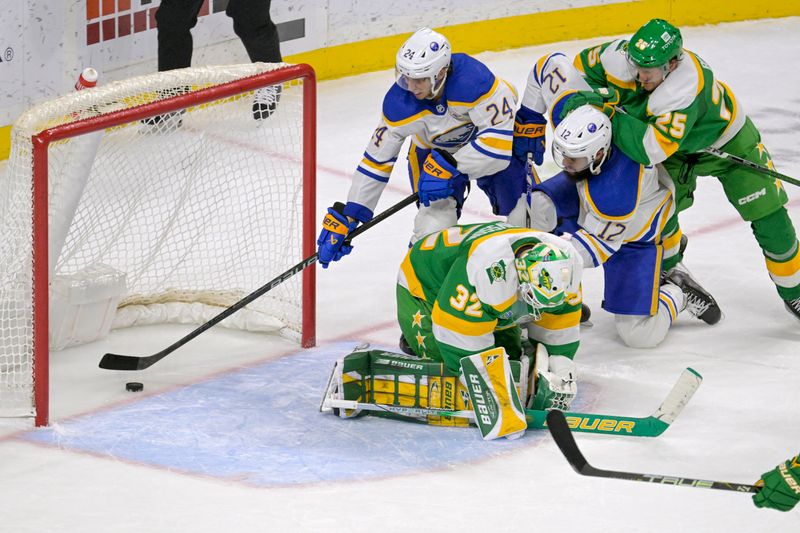 Feb 17, 2024; Saint Paul, Minnesota, USA;  Buffalo Sabres forward Dylan Cozens (24) put the puck past Minnesota Wild goalie Filip Gustavsson (32) for a goal during the third period at Xcel Energy Center. Mandatory Credit: Nick Wosika-USA TODAY Sports