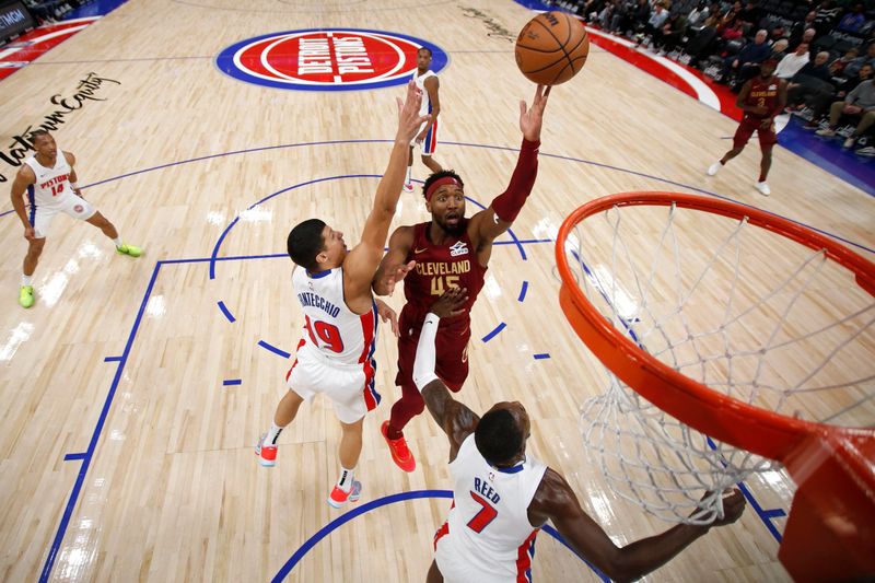 DETROIT, MI - OCTOBER 16: Donovan Mitchell #45 of the Cleveland Cavaliers drives to the basket during the game against the Detroit Pistons on October 16, 2024 at Little Caesars Arena in Detroit, Michigan. NOTE TO USER: User expressly acknowledges and agrees that, by downloading and/or using this photograph, User is consenting to the terms and conditions of the Getty Images License Agreement. Mandatory Copyright Notice: Copyright 2024 NBAE (Photo by Brian Sevald/NBAE via Getty Images)