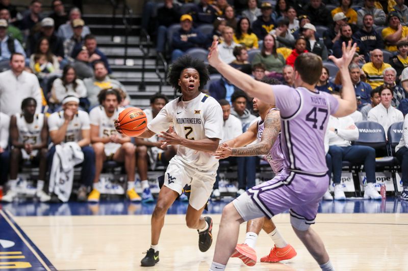 Jan 27, 2026; Morgantown, West Virginia, USA; West Virginia Mountaineers guard Amir Jenkins (2) drives baseline during the second half against the Kansas State Wildcats at Hope Coliseum. Mandatory Credit: Ben Queen-Imagn Imagesa