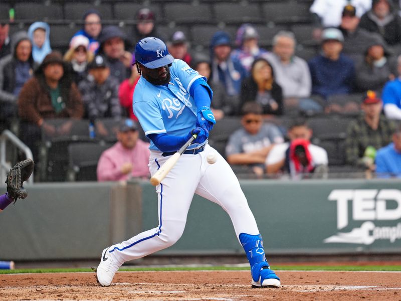 Mar 19, 2023; Summerlin, Nevada, USA; Kansas City Royals designated hitter Franmil Reyes (99) bats against the Colorado Rockies during the third inning at Las Vegas Ballpark. Mandatory Credit: Stephen R. Sylvanie-USA TODAY Sports