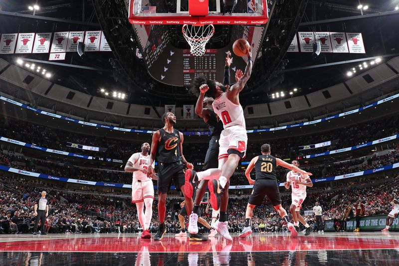 CHICAGO, IL - FEBRUARY 28: Coby White #0 of the Chicago Bulls shoots the ball during the game against the Cleveland Cavaliers on February 28, 2024 at United Center in Chicago, Illinois. NOTE TO USER: User expressly acknowledges and agrees that, by downloading and or using this photograph, User is consenting to the terms and conditions of the Getty Images License Agreement. Mandatory Copyright Notice: Copyright 2024 NBAE (Photo by Jeff Haynes/NBAE via Getty Images)