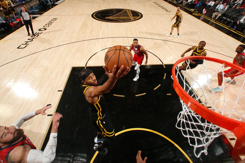 SAN FRANCISCO, CA - JANUARY 10: Moses Moody #4 of the Golden State Warriors drives to the basket during the game against the New Orleans Pelicans on January 10, 2024 at Chase Center in San Francisco, California. NOTE TO USER: User expressly acknowledges and agrees that, by downloading and or using this photograph, user is consenting to the terms and conditions of Getty Images License Agreement. Mandatory Copyright Notice: Copyright 2024 NBAE (Photo by Jed Jacobsohn/NBAE via Getty Images)