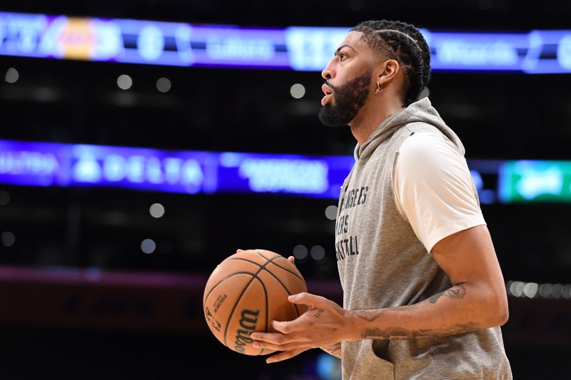 LOS ANGELES, CA - FEBRUARY 29: Anthony Davis #3 of the Los Angeles Lakers warms up before the game against the Washington Wizards on February 29, 2024 at Crypto.Com Arena in Los Angeles, California. NOTE TO USER: User expressly acknowledges and agrees that, by downloading and/or using this Photograph, user is consenting to the terms and conditions of the Getty Images License Agreement. Mandatory Copyright Notice: Copyright 2024 NBAE (Photo by Andrew D. Bernstein/NBAE via Getty Images)