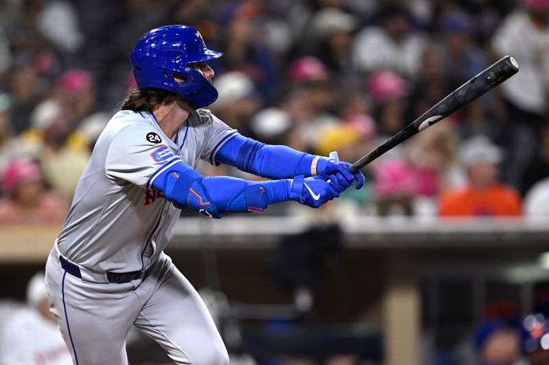 Aug 22, 2024; San Diego, California, USA; New York Mets designated hitter Jesse Winker (3) hits an RBI double against the San Diego Padres during the ninth inning at Petco Park. Mandatory Credit: Orlando Ramirez-USA TODAY Sports