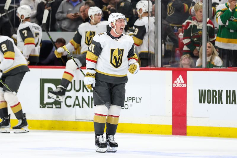 Apr 3, 2023; Saint Paul, Minnesota, USA; Vegas Golden Knights right wing Jonathan Marchessault (81) celebrates right wing Reilly Smith's (19) game winning shootout goal against the Minnesota Wild at Xcel Energy Center. Mandatory Credit: Matt Krohn-USA TODAY Sports