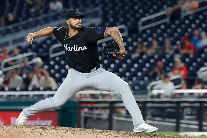 Sep 12, 2024; Washington, District of Columbia, USA; Miami Marlins pitcher Jesus Tinoco (38) pitches against the Washington Nationals during the ninth inning at Nationals Park. Mandatory Credit: Geoff Burke-Imagn Images