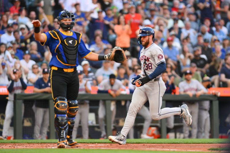 Jul 19, 2024; Seattle, Washington, USA; Houston Astros right fielder Trey Cabbage (38) scores a run against the Seattle Mariners during the third inning at T-Mobile Park. Mandatory Credit: Steven Bisig-USA TODAY Sports