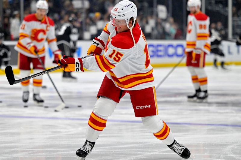 Apr 11, 2024; Los Angeles, California, USA;  Calgary Flames left wing Dryden Hunt (15) warms up prior to the game against the Los Angeles Kings at Crypto.com Arena. Mandatory Credit: Jayne Kamin-Oncea-USA TODAY Sports