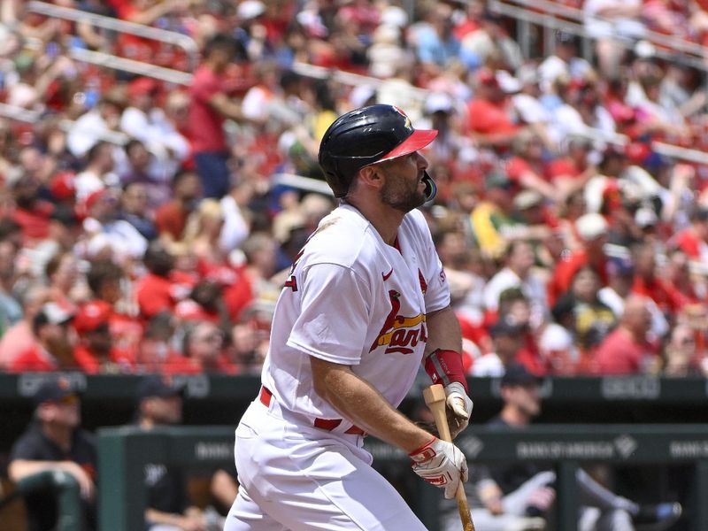 May 7, 2023; St. Louis, Missouri, USA;  St. Louis Cardinals first baseman Paul Goldschmidt (46) hits a solo home run against the Detroit Tigers during the third inning at Busch Stadium. Mandatory Credit: Jeff Curry-USA TODAY Sports