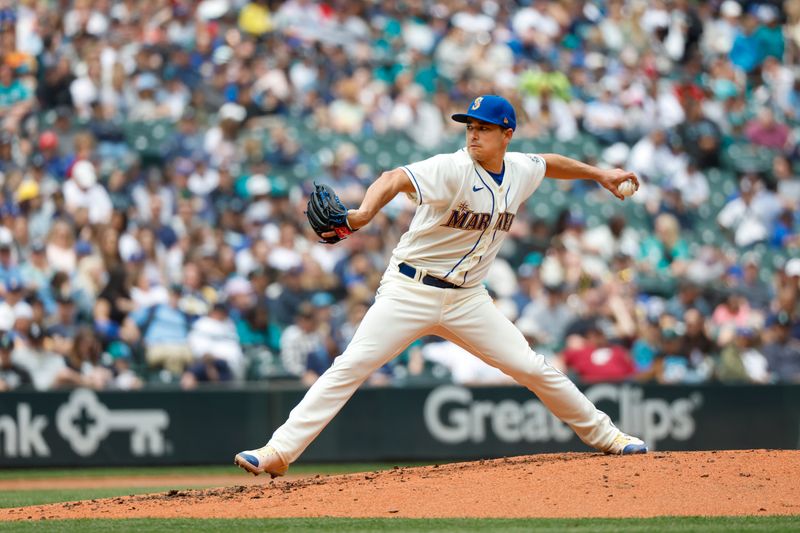 May 28, 2023; Seattle, Washington, USA; Seattle Mariners starting pitcher Marco Gonzales (7) throws against the Pittsburgh Pirates during the third inning at T-Mobile Park. Mandatory Credit: Joe Nicholson-USA TODAY Sports