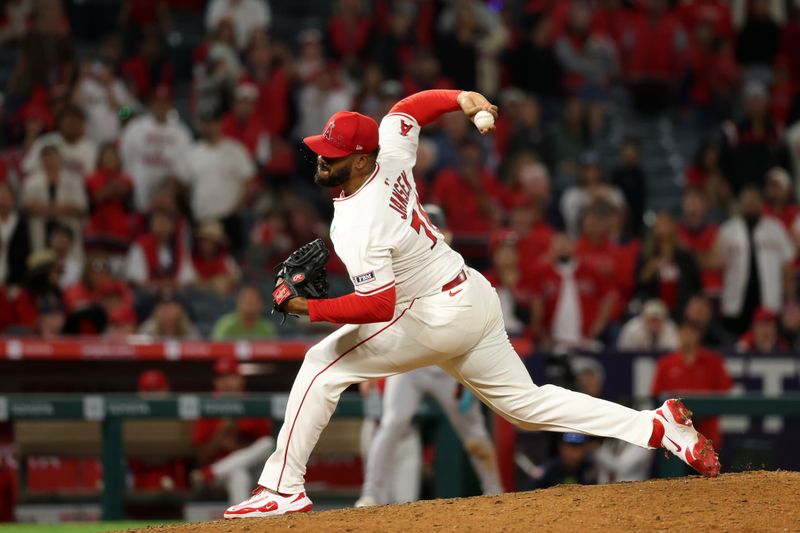May 23, 2025; Anaheim, California, USA;  Los Angeles Angels relief pitcher Kenley Jansen (74) pitches during the ninth inning against the Miami Marlins at Angel Stadium. Mandatory Credit: Kiyoshi Mio-Imagn Images