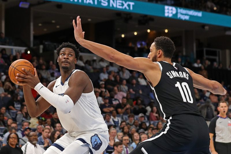 MEMPHIS, TENNESSEE - OCTOBER 30: Jaren Jackson Jr. #13 of the Memphis Grizzlies handles the ball against Ben Simmons #10 of the Brooklyn Nets during the second half at FedExForum on October 30, 2024 in Memphis, Tennessee. NOTE TO USER: User expressly acknowledges and agrees that, by downloading and or using this photograph, User is consenting to the terms and conditions of the Getty Images License Agreement. (Photo by Justin Ford/Getty Images)