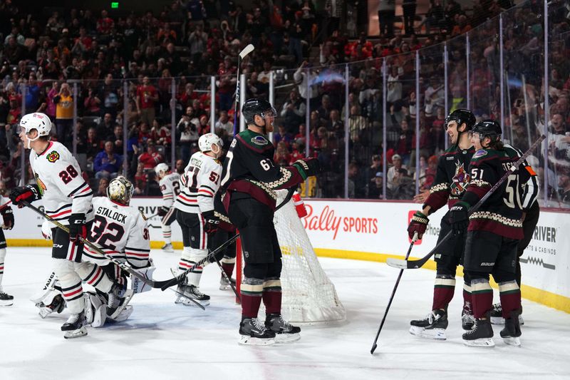 Feb 28, 2023; Tempe, Arizona, USA; Arizona Coyotes center Jack McBain (22) celebrates his goal against the Chicago Blackhawks during the second period at Mullett Arena. Mandatory Credit: Joe Camporeale-USA TODAY Sports