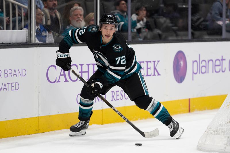 Nov 7, 2024; San Jose, California, USA;  San Jose Sharks left wing William Eklund (72) controls the puck during the third period against the Minnesota Wild at SAP Center at San Jose. Mandatory Credit: Stan Szeto-Imagn Images