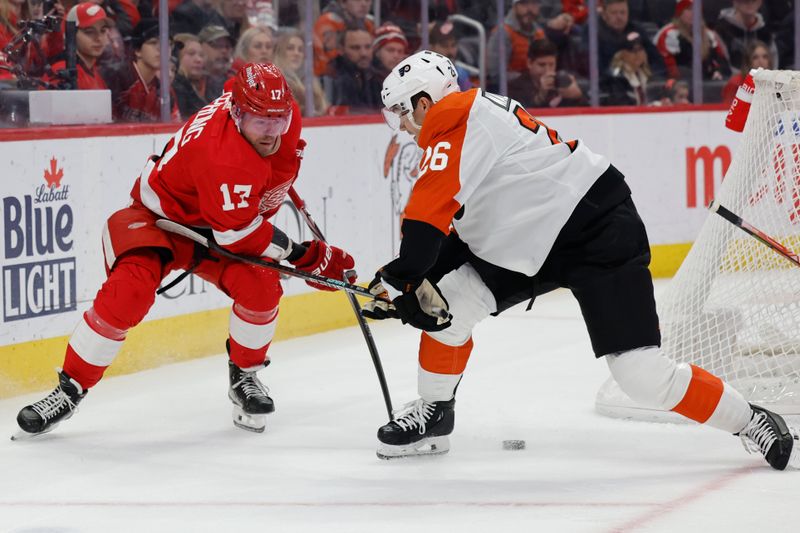 Jan 25, 2024; Detroit, Michigan, USA;  Detroit Red Wings right wing Daniel Sprong (17) skates with the puck defended by Philadelphia Flyers defenseman Sean Walker (26) in the second period at Little Caesars Arena. Mandatory Credit: Rick Osentoski-USA TODAY Sports