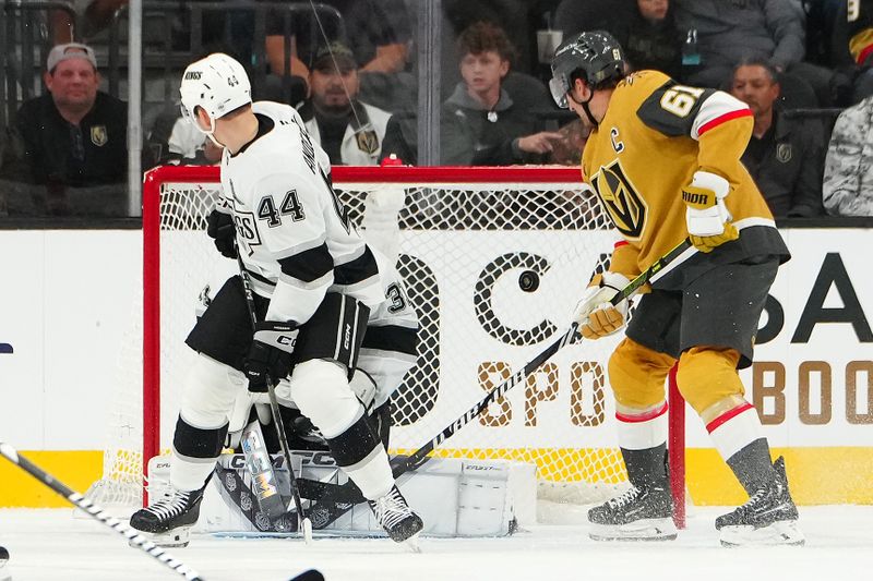 Oct 22, 2024; Las Vegas, Nevada, USA; Vegas Golden Knights right wing Mark Stone (61) deflects the puck to score a goal against the Los Angeles Kings during first period at T-Mobile Arena. Mandatory Credit: Stephen R. Sylvanie-Imagn Images