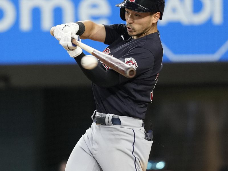 Jul 16, 2023; Arlington, Texas, USA; Cleveland Guardians left fielder Steven Kwan (38) singles against the Texas Rangers during the ninth inning at Globe Life Field. Mandatory Credit: Jim Cowsert-USA TODAY Sports