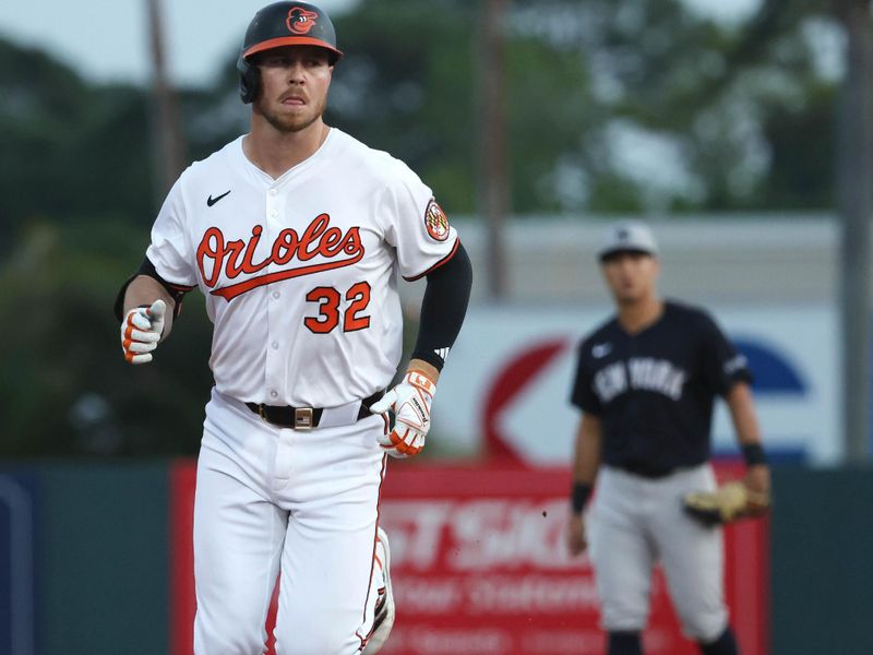 Mar 20, 2025; Sarasota, Florida, USA; Baltimore Orioles first base Ryan O'Hearn (32) runs around the bases after he hit a home run during the first inning against the New York Yankees at Ed Smith Stadium. Mandatory Credit: Kim Klement Neitzel-Imagn Images