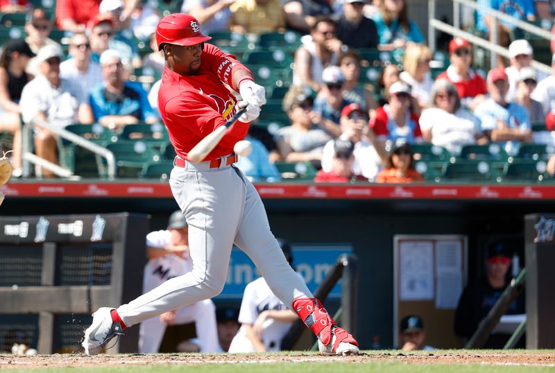 Feb 26, 2023; Jupiter, Florida, USA; St. Louis Cardinals left fielder Jordan Walker (67) singles in the third inning against the Miami Marlins at Roger Dean Stadium. Mandatory Credit: Rhona Wise-USA TODAY Sports