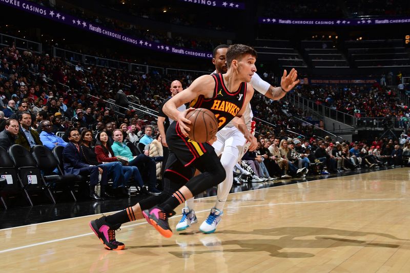 ATLANTA, GA - FEBRUARY 5: Bogdan Bogdanovic #13 of the Atlanta Hawks drives to the basket during the game against the LA Clippers on February 5, 2024 at State Farm Arena in Atlanta, Georgia.  NOTE TO USER: User expressly acknowledges and agrees that, by downloading and/or using this Photograph, user is consenting to the terms and conditions of the Getty Images License Agreement. Mandatory Copyright Notice: Copyright 2024 NBAE (Photo by Scott Cunningham/NBAE via Getty Images)