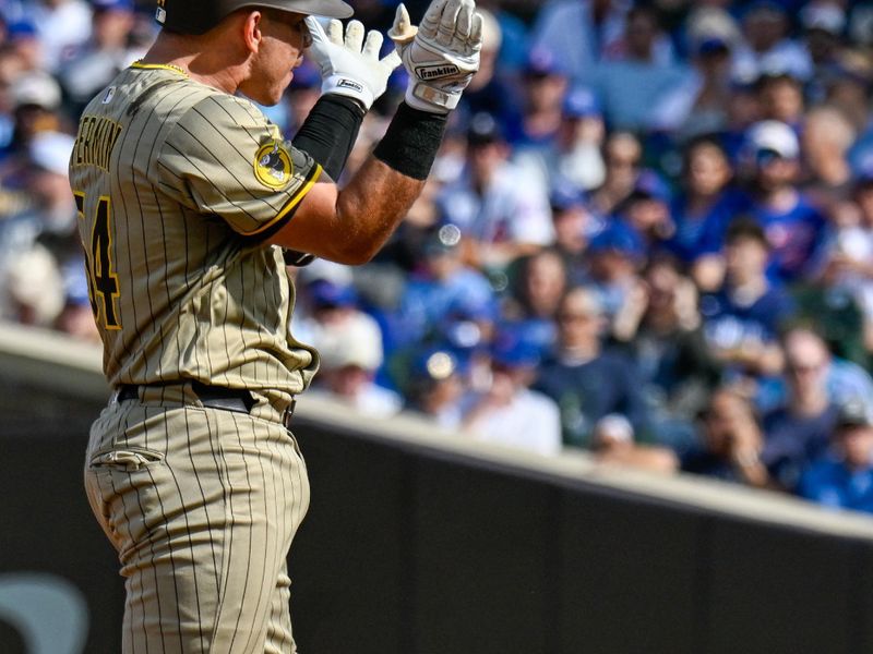 Oct 1, 2025; Chicago, Illinois, USA; San Diego Padres catcher Freddy Fermin (54) reacts after hitting a double in the third inning against the Chicago Cubs during game two of the Wildcard round for the 2025 MLB playoffs at Wrigley Field. Mandatory Credit: Matt Marton-Imagn Images