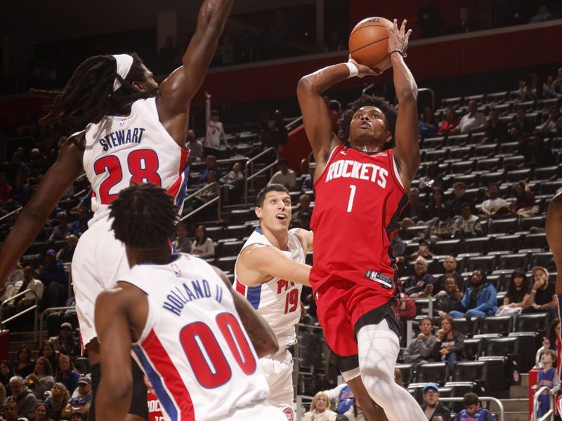 DETROIT, MI - NOVEMBER 10: Amen Thompson #1 of the Houston Rockets drives to the basket during the game against the Detroit Pistons on November 10, 2024 at Little Caesars Arena in Detroit, Michigan. NOTE TO USER: User expressly acknowledges and agrees that, by downloading and/or using this photograph, User is consenting to the terms and conditions of the Getty Images License Agreement. Mandatory Copyright Notice: Copyright 2024 NBAE (Photo by Brian Sevald/NBAE via Getty Images)