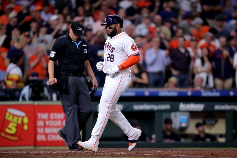 Apr 30, 2024; Houston, Texas, USA; Houston Astros first baseman Jon Singleton (28) crosses home plate after hitting a three-run home run against the Cleveland Guardians during the fourth inning at Minute Maid Park. Mandatory Credit: Erik Williams-USA TODAY Sports