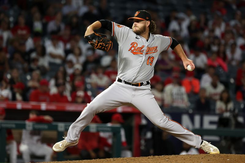 Sep 6, 2023; Anaheim, California, USA; Baltimore Orioles starting pitcher Cole Irvin (19) pitches during the ninth inning against the Los Angeles Angels at Angel Stadium. Mandatory Credit: Kiyoshi Mio-USA TODAY Sports