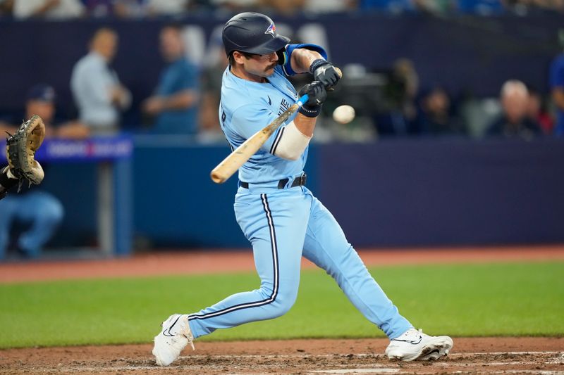 Aug 16, 2023; Toronto, Ontario, CAN; Toronto Blue Jays pinch hitter Davis Schneider (36) during an at bat against the Philadelphia Phillies during the ninth inning at Rogers Centre. Mandatory Credit: John E. Sokolowski-USA TODAY Sports