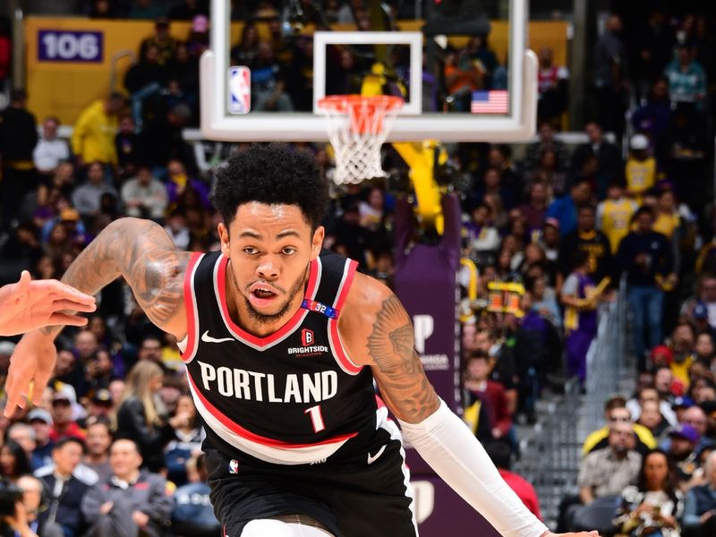 LOS ANGELES, CA - DECEMBER 8: Anfernee Simons #1 of the Portland Trail Blazers drives to the basket during the game against the Los Angeles Lakers on December 8, 2024 at Crypto.Com Arena in Los Angeles, California. NOTE TO USER: User expressly acknowledges and agrees that, by downloading and/or using this Photograph, user is consenting to the terms and conditions of the Getty Images License Agreement. Mandatory Copyright Notice: Copyright 2024 NBAE (Photo by Adam Pantozzi/NBAE via Getty Images)