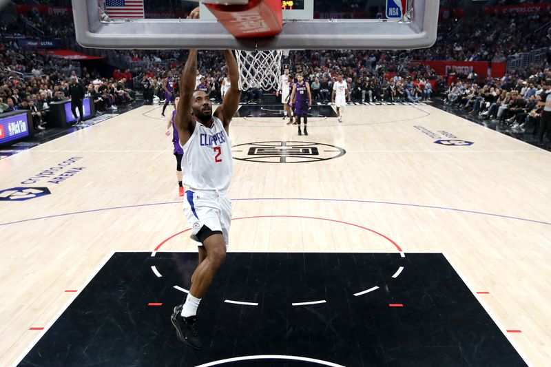 LOS ANGELES, CALIFORNIA - FEBRUARY 25: Kawhi Leonard #2 of the Los Angeles Clippers dunks the ball during the first quarter against the Sacramento Kings at Crypto.com Arena on February 25, 2024 in Los Angeles, California. The Sacramento Kings defeated the Los Angeles Clippers 123-107. NOTE TO USER: User expressly acknowledges and agrees that, by downloading and or using this photograph, User is consenting to the terms and conditions of the Getty Images License Agreement. (Photo by Katelyn Mulcahy/Getty Images)