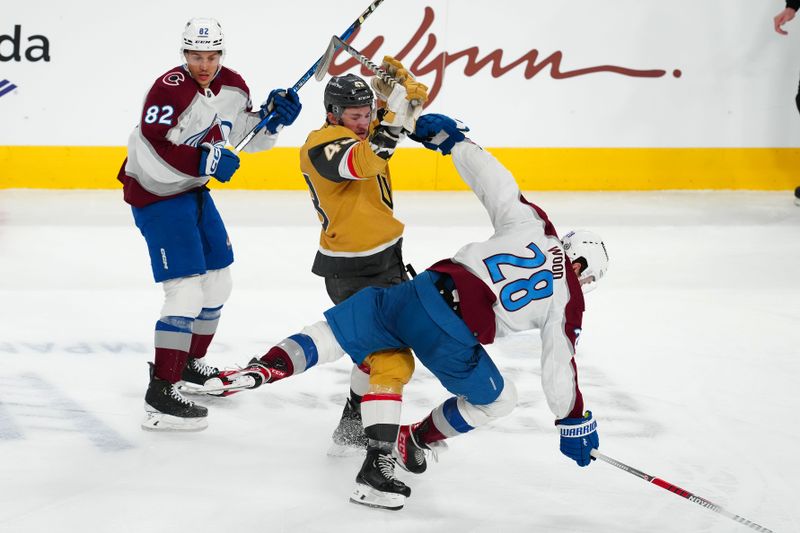 Apr 14, 2024; Las Vegas, Nevada, USA; Vegas Golden Knights center Paul Cotter (43) checks Colorado Avalanche left wing Miles Wood (28) in front of defenseman Caleb Jones (82) during the third period at T-Mobile Arena. Mandatory Credit: Stephen R. Sylvanie-USA TODAY Sports