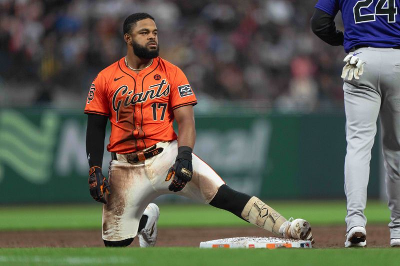 Jul 26, 2024; San Francisco, California, USA;  San Francisco Giants outfielder Heliot Ramos (17) reacts at third base after hitting a triple during the third inning against the Colorado Rockies at Oracle Park. Mandatory Credit: Stan Szeto-USA TODAY Sports