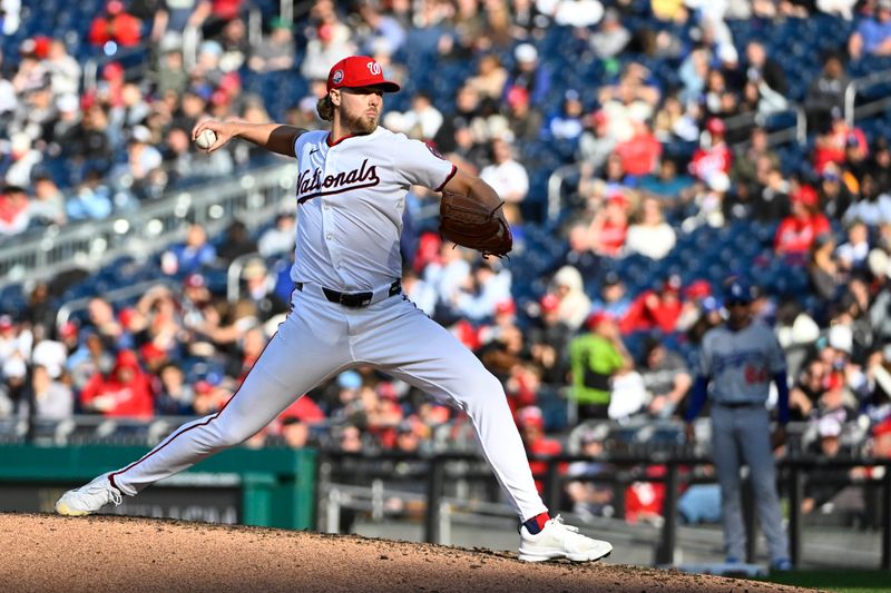 Apr 9, 2025; Washington, District of Columbia, USA; Washington Nationals pitcher Jake Irvin (27) throws to the Los Angeles Dodgers during the fifth inning at Nationals Park. Mandatory Credit: Brad Mills-Imagn Images