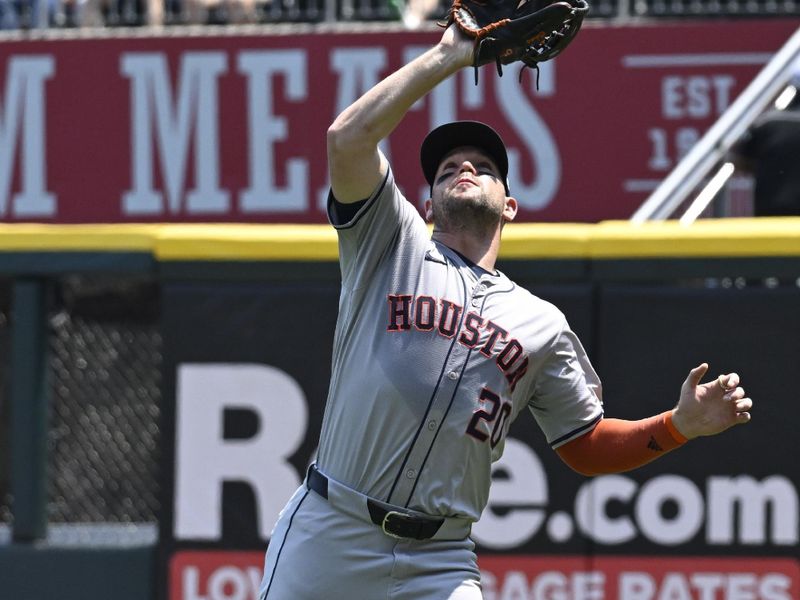 Jun 20, 2024; Chicago, Illinois, USA;  Houston Astros outfielder Chas McCormick (20) catches a fly ball hit by Chicago White Sox third base Danny Mendick (0) during the second inning at Guaranteed Rate Field. Mandatory Credit: Matt Marton-USA TODAY Sports