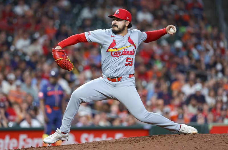 Jun 3, 2024; Houston, Texas, USA; St. Louis Cardinals relief pitcher JoJo Romero (59) delivers a pitch during the seventh inning against the Houston Astros at Minute Maid Park. Mandatory Credit: Troy Taormina-USA TODAY Sports