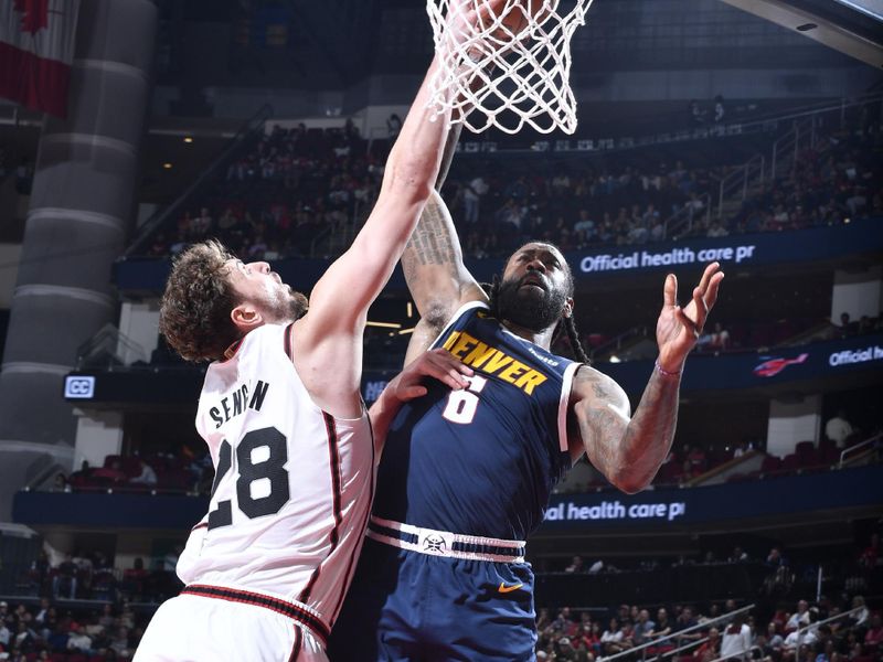 HOUSTON, TX - MARCH 23:  DeAndre Jordan #6 of the Denver Nuggets drives to the basket during the game against the Houston Rockets on March 23, 2025 at the Toyota Center in Houston, Texas. NOTE TO USER: User expressly acknowledges and agrees that, by downloading and or using this photograph, User is consenting to the terms and conditions of the Getty Images License Agreement. Mandatory Copyright Notice: Copyright 2025 NBAE (Photo by Logan Riely/NBAE via Getty Images)