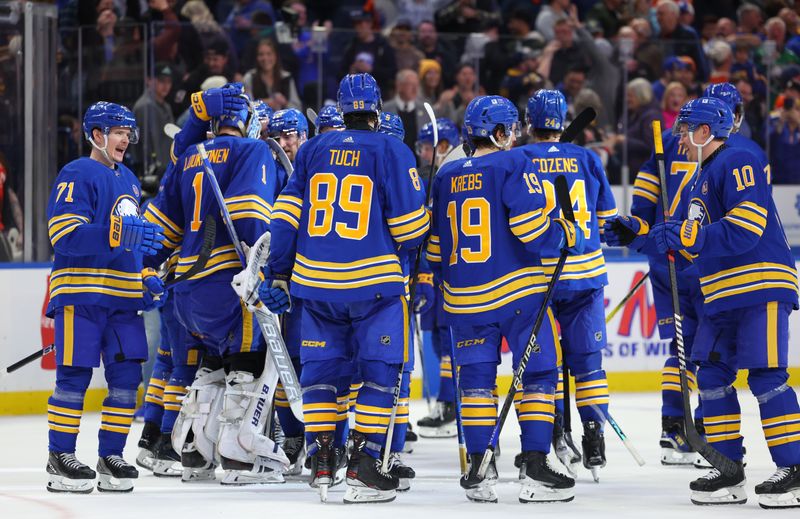 Mar 9, 2024; Buffalo, New York, USA;  The Buffalo Sabres celebrate a win over the Edmonton Oilers at KeyBank Center. Mandatory Credit: Timothy T. Ludwig-USA TODAY Sports