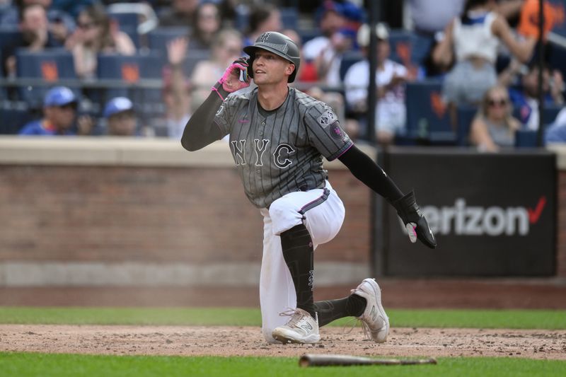 Jun 29, 2024; New York City, New York, USA; New York Mets outfielder Brandon Nimmo (9) scores on a two RBI single by New York Mets first baseman Pete Alonso (not pictured) during the second inning against the Houston Astros at Citi Field. Mandatory Credit: John Jones-USA TODAY Sports