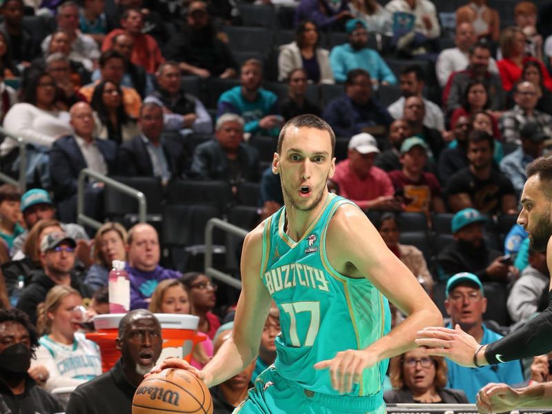 CHARLOTTE, NC - MARCH 27: Aleksej Pokusevski #17 of the Charlotte Hornets goes to the basket during the game on March 27, 2024 at Spectrum Center in Charlotte, North Carolina. NOTE TO USER: User expressly acknowledges and agrees that, by downloading and or using this photograph, User is consenting to the terms and conditions of the Getty Images License Agreement. Mandatory Copyright Notice: Copyright 2024 NBAE (Photo by Kent Smith/NBAE via Getty Images)